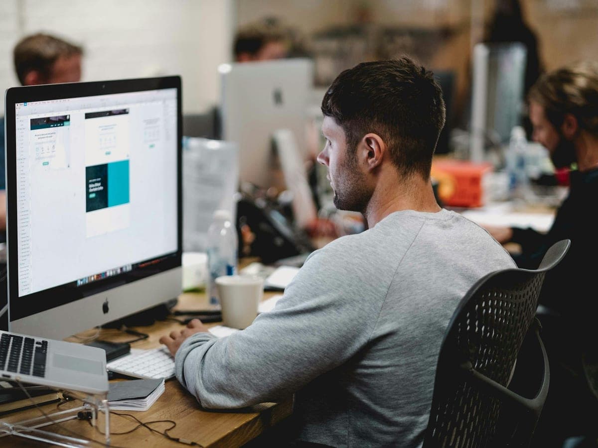 A designer working on several projects in a studio